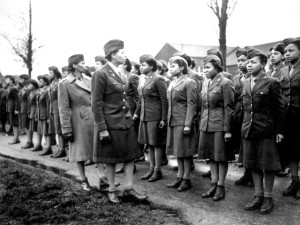 Women's Army Corps World War II. Maj. Charity E. Adams and Capt. Abbie N. Campbell inspect the first contingent of black members of the Women's Army Corps assigned to overseas service in WWII. Source: National Archives