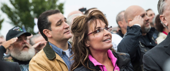 WASHINGTON, DC - OCTOBER 13: Former Alaskan Governor Sarah Palin (R) and Sen. Ted Cruz (R-TX) recite the Pledge of Allegiance at a rally supported by military veterans, Tea Party activists and Republicans, regarding the government shutdown on October 13, 2013 in Washington, DC. (Photo by Andrew Burton/Getty Images)