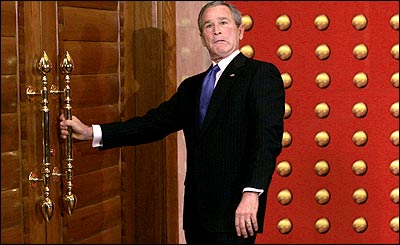 http://www.bobcesca.com/images/Bush-door-idiot.jpg